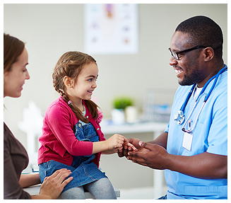 Family at Clinic Speaking with Staff Member